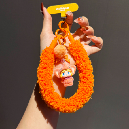 Bracelet, Dragonne - Lanière Téléphone Poignet Moelleuse Orange avec Porte-clés Poupée et Pompon, prix de gros.
