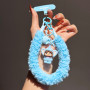Bracelet, Sangle, Cordons - Lanière Téléphone Poignet Moelleuse Violet avec Porte-clés Poupée et Pompon, prix de gros.